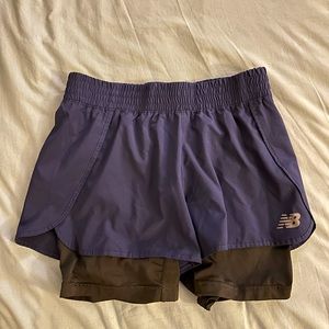 Navy New Balance running shorts. Size Medium.